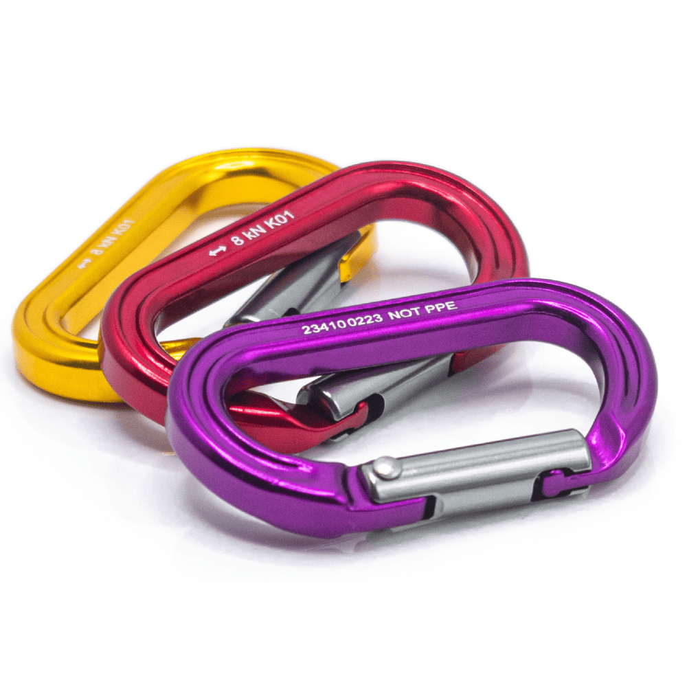 At Height K01 Single Action Accessory Carabiner all three colours purple, red and orange piled on top of each other